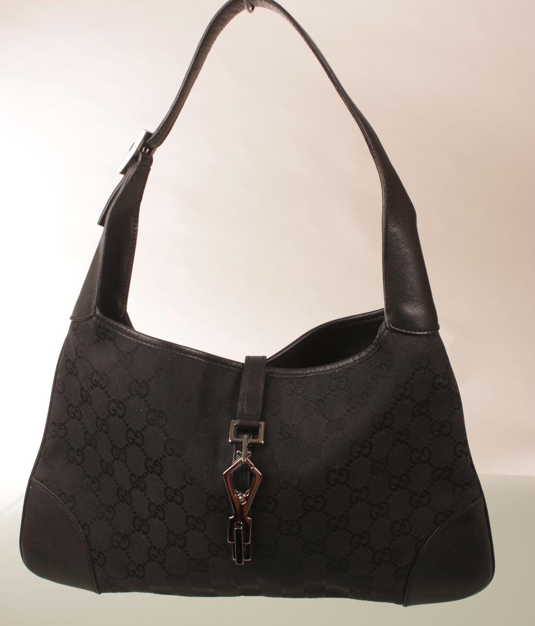 Gucci GG monogrammi Jackie musta kanvaasilaukku